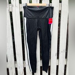 Spanx Faux leather black leggings with white stripe.